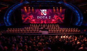 A high-angle shot of a sleek modern stage with a vibrant video display backdrop showcasing the Dota 2 tournament logo. On the stage, rows of trophies and suitcases filled with cash prizes are meticulously arranged, creating a sense of anticipation and excitement. The lighting is dramatic, casting warm hues and long shadows, highlighting the grandeur of the event. In the foreground, a crowd of spectators gazes in awe, their faces illuminated by the spectacular scene. The overall atmosphere conveys the magnitude and prestige of the Dota 2 tournament, where the distribution of the massive prize pool is celebrated with a sense of ceremony and prestige. A high-angle shot of a sleek modern stage with a vibrant video display backdrop showcasing the Dota 2 tournament logo. On the stage, rows of trophies and suitcases filled with cash prizes are meticulously arranged, creating a sense of anticipation and excitement. The lighting is dramatic, casting warm hues and long shadows, highlighting the grandeur of the event. In the foreground, a crowd of spectators gazes in awe, their faces illuminated by the spectacular scene. The overall atmosphere conveys the magnitude and prestige of the Dota 2 tournament, where the distribution of the massive prize pool is celebrated with a sense of ceremony and prestige.